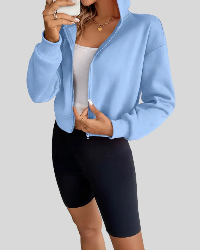 EaseForm Zip Hoodie Jacket in light blue front view with hood up highlighting coverage and shape