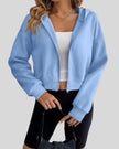 EaseForm Zip Hoodie Jacket in light blue front semi-open view showing relaxed fit and clean silhouette