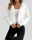 EaseForm Zip Hoodie Jacket in white front semi-open view showing relaxed fit and clean silhouette