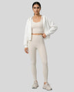 EaseForm Zip Hoodie Jacket in white worn by model full body front view styled in a clean studio setting