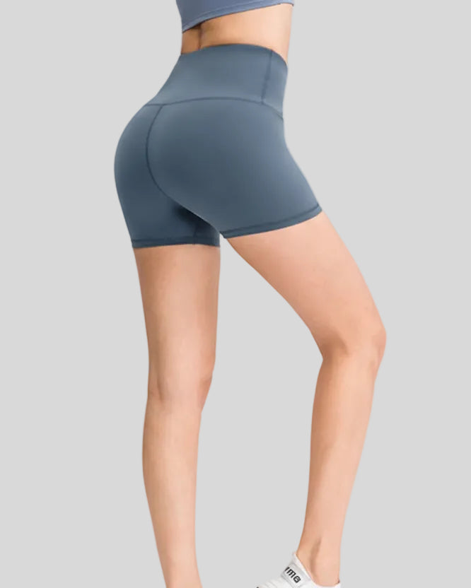 Back view of Athlesi EasyFlex wide-waistband active short in dusty blue