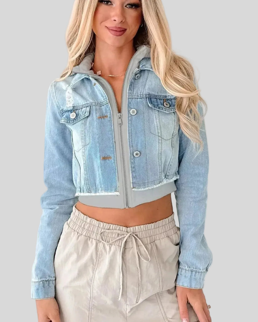 Athlesi EdgeForm denim hoodie jacket in light blue and gray, angled closed view highlighting cropped cut and layered hoodie