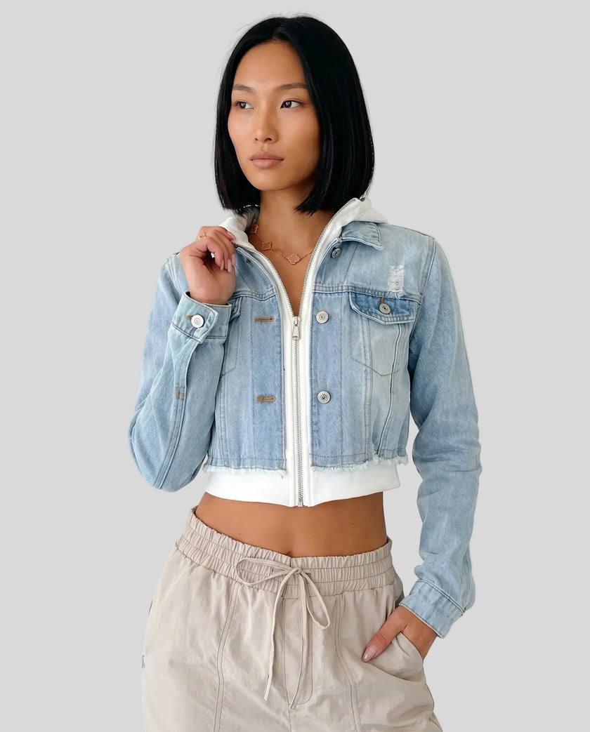 Front view of model wearing Athlesi EdgeForm light blue denim jacket and beige pants