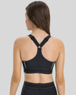 Racerback view of the EdgeForm Sports Bra in Black showing supportive design and clean finish