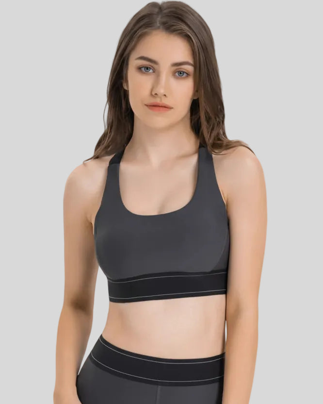 EdgeForm Sports Bra in Gray with rounded neckline and contrast detailing shown from the front