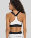 Racerback view of the EdgeForm Sports Bra in White showing supportive design and clean finish