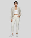 Éloise Tweed Bomber Jacket styled front full body view layered over a minimal outfit for an elevated street style look
