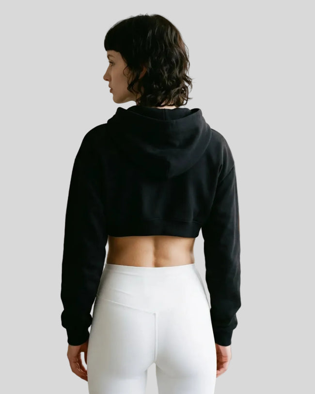 Model wearing Everyday Cropped Hoodie in Black back view