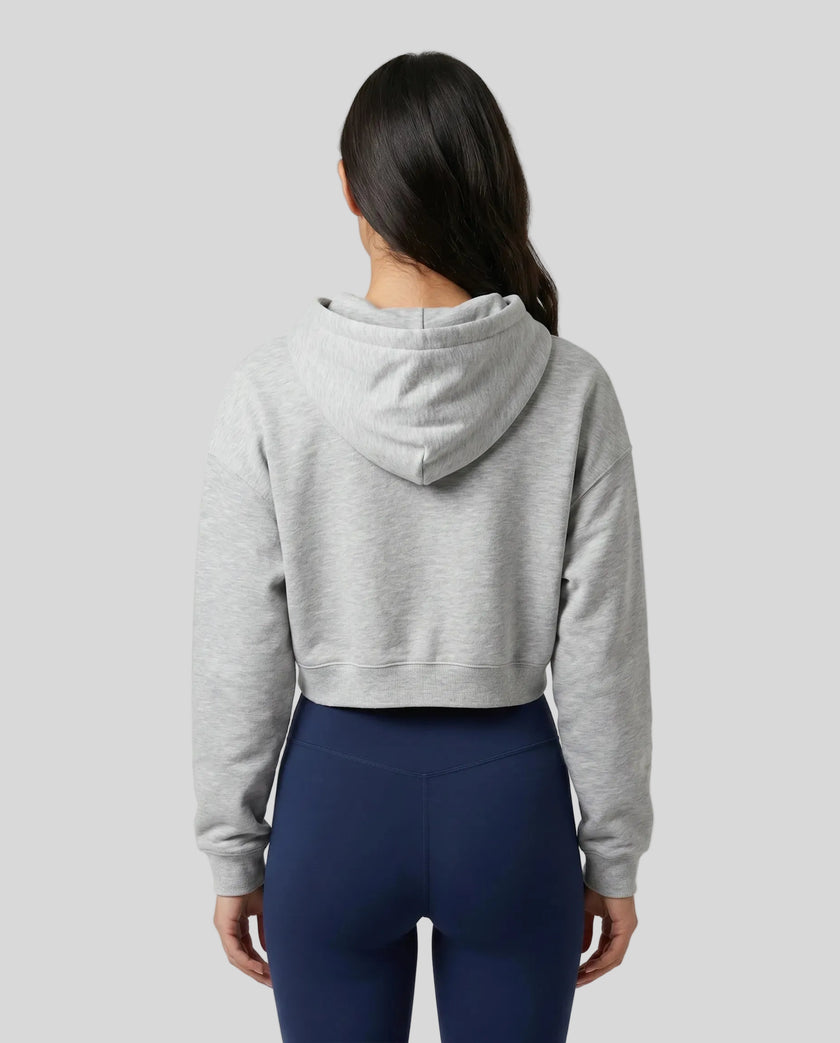 Model wearing Everyday Cropped Hoodie in Flower Gray back view