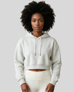 Model wearing Everyday Cropped Hoodie in Oat Gray front view