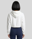 Model wearing Everyday Cropped Hoodie in White back view