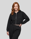 Model wearing the Everyday Cropped Zip-Up Hoodie in Black viewed from the front