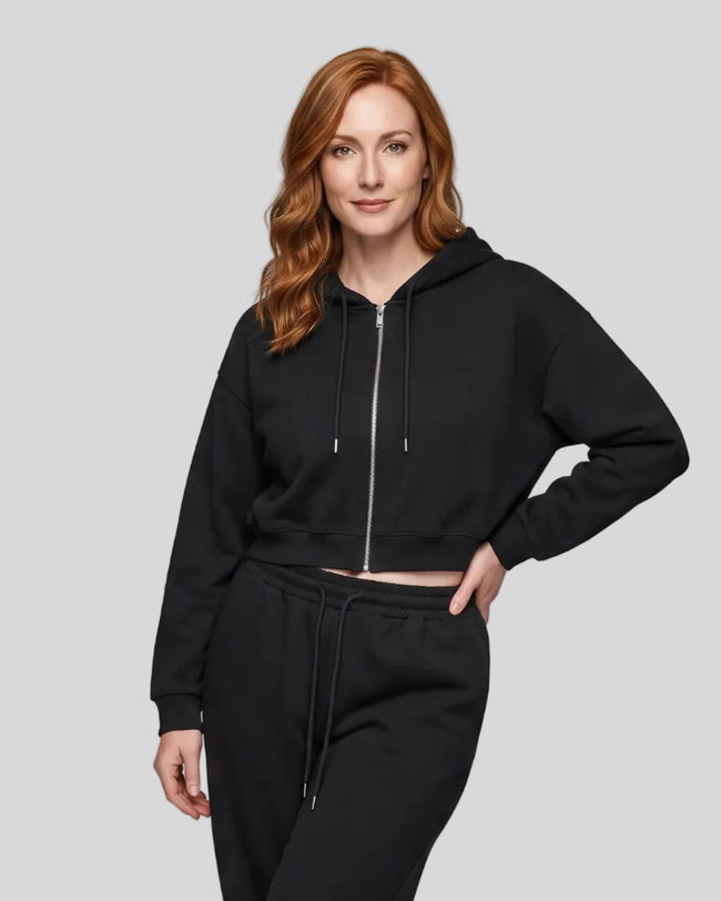 Model wearing the Everyday Cropped Zip-Up Hoodie in Black viewed from the front