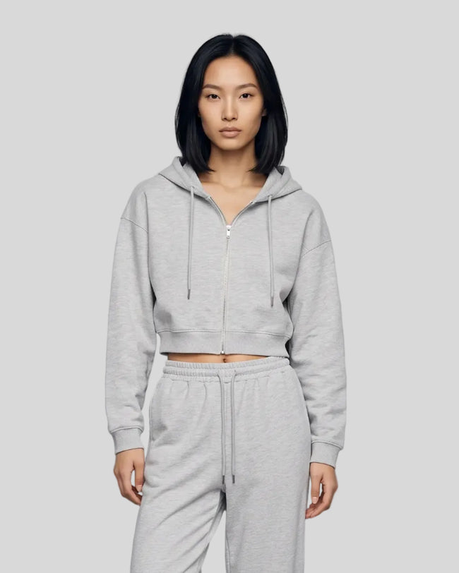 Model wearing the Everyday Cropped Zip-Up Hoodie in Flower Gray viewed from the front