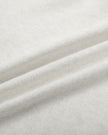 Close-up of the soft cotton-blend fleece fabric on the Everyday Cropped Zip-Up Hoodie in Oat Gray