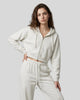 Model wearing the Everyday Cropped Zip-Up Hoodie in Oat Gray viewed from the front