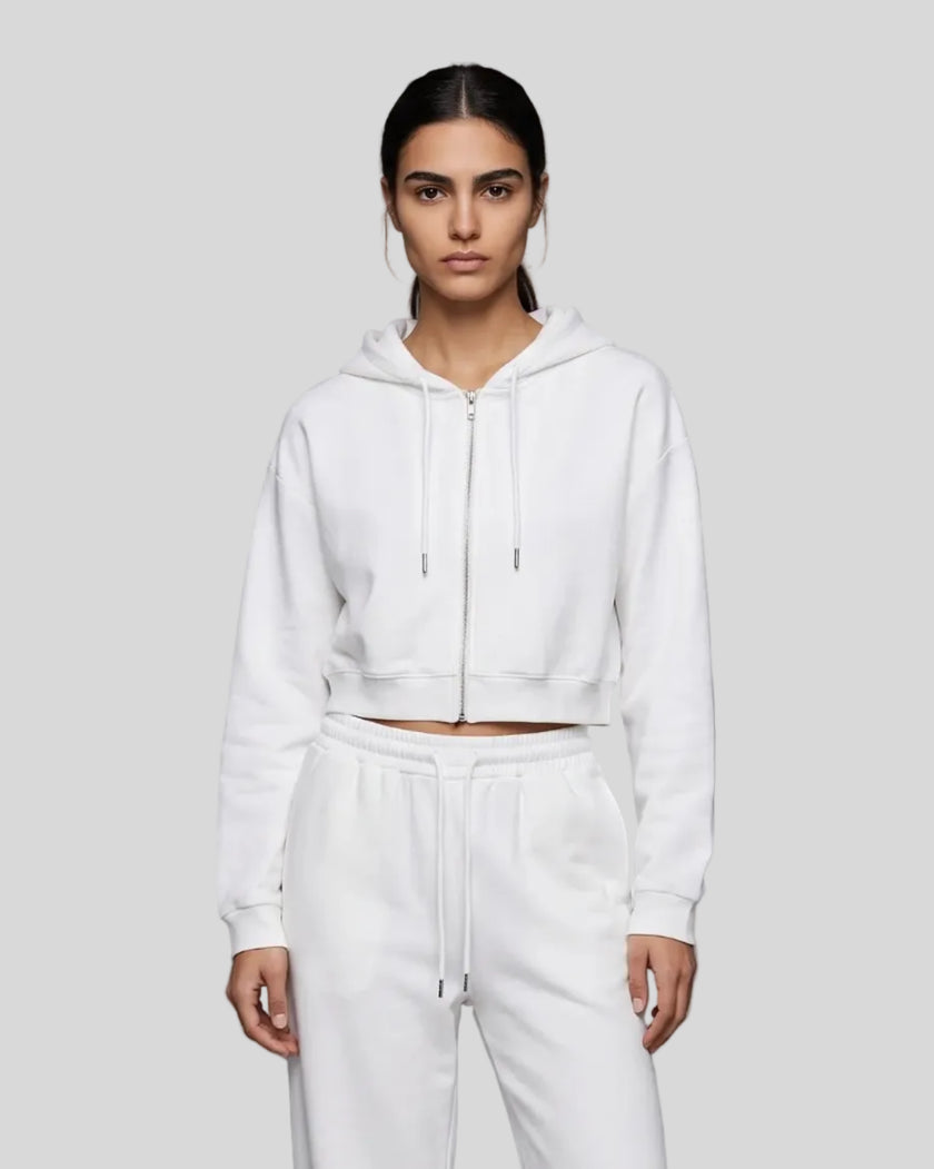 Model wearing the Everyday Cropped Zip-Up Hoodie in White viewed from the front