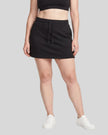 Model wearing the Everyday Drawstring Skirt in Black viewed from the front