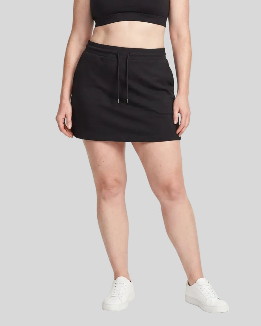 Model wearing the Everyday Drawstring Skirt in Black viewed from the front