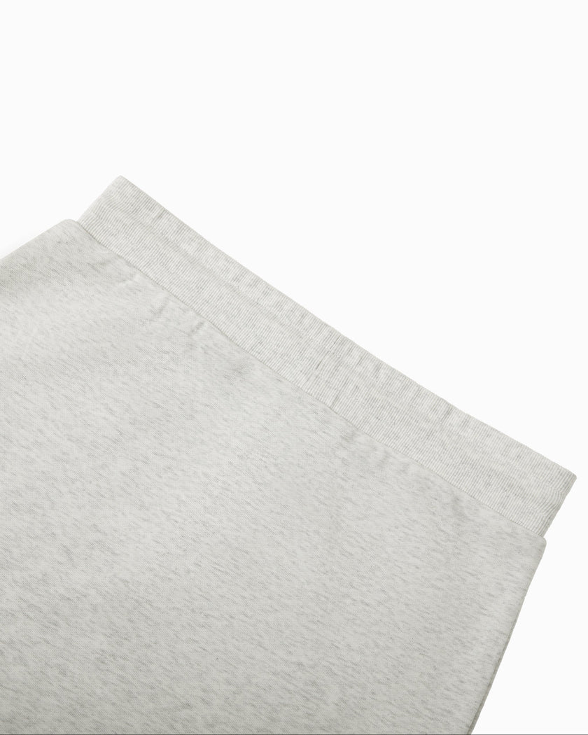 Close-up of the back elastic waistband on the Everyday Drawstring Skirt in Oat Gray