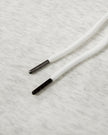 Close-up of the adjustable drawstring detail on the Everyday Drawstring Skirt in Oat Gray
