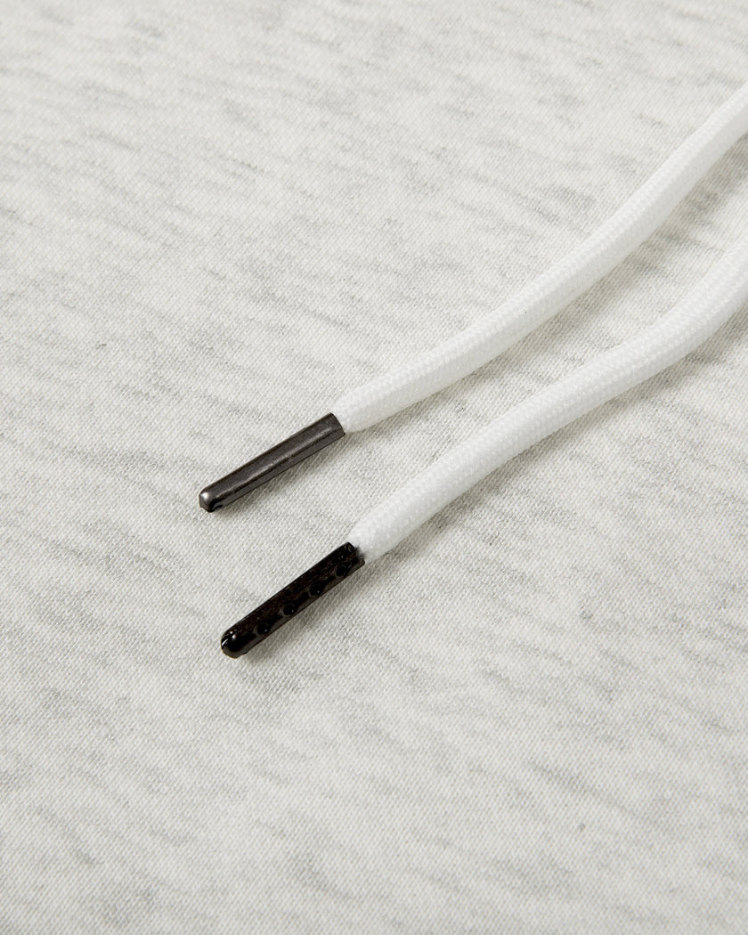 Close-up of the adjustable drawstring detail on the Everyday Drawstring Skirt in Oat Gray