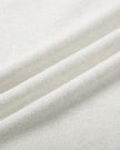 Close-up of the soft cotton-blend fabric on the Everyday Drawstring Skirt in Oat Gray