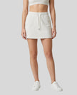 Model wearing the Everyday Drawstring Skirt in Oat Gray viewed from the front