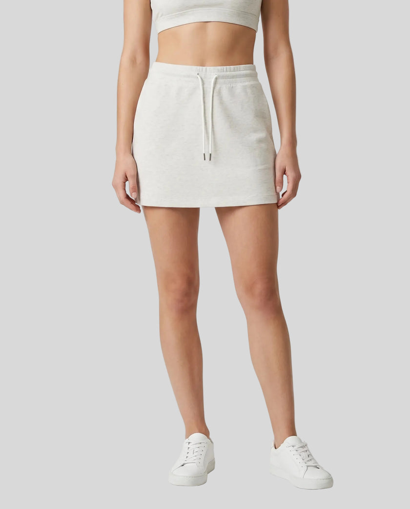 Model wearing the Everyday Drawstring Skirt in Oat Gray viewed from the front