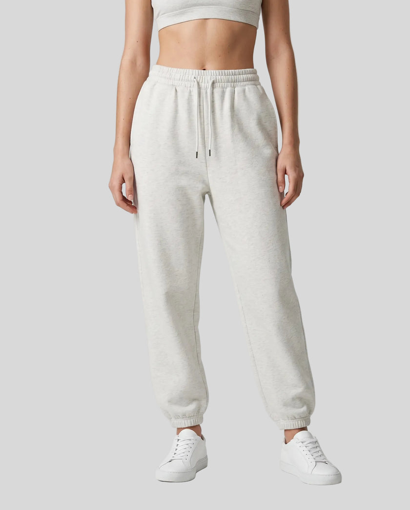 Model wearing Everyday Jogger Pants in Oat Gray front view