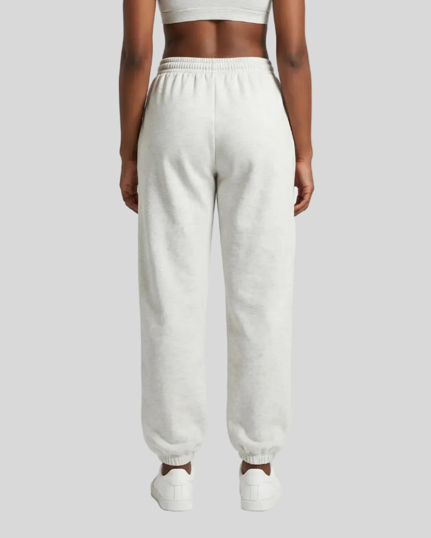 Model wearing Everyday Jogger Pants in Oat Gray back view