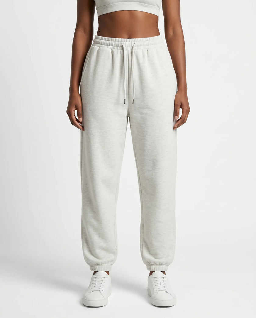 Model wearing Everyday Jogger Pants in Oat Gray front view
