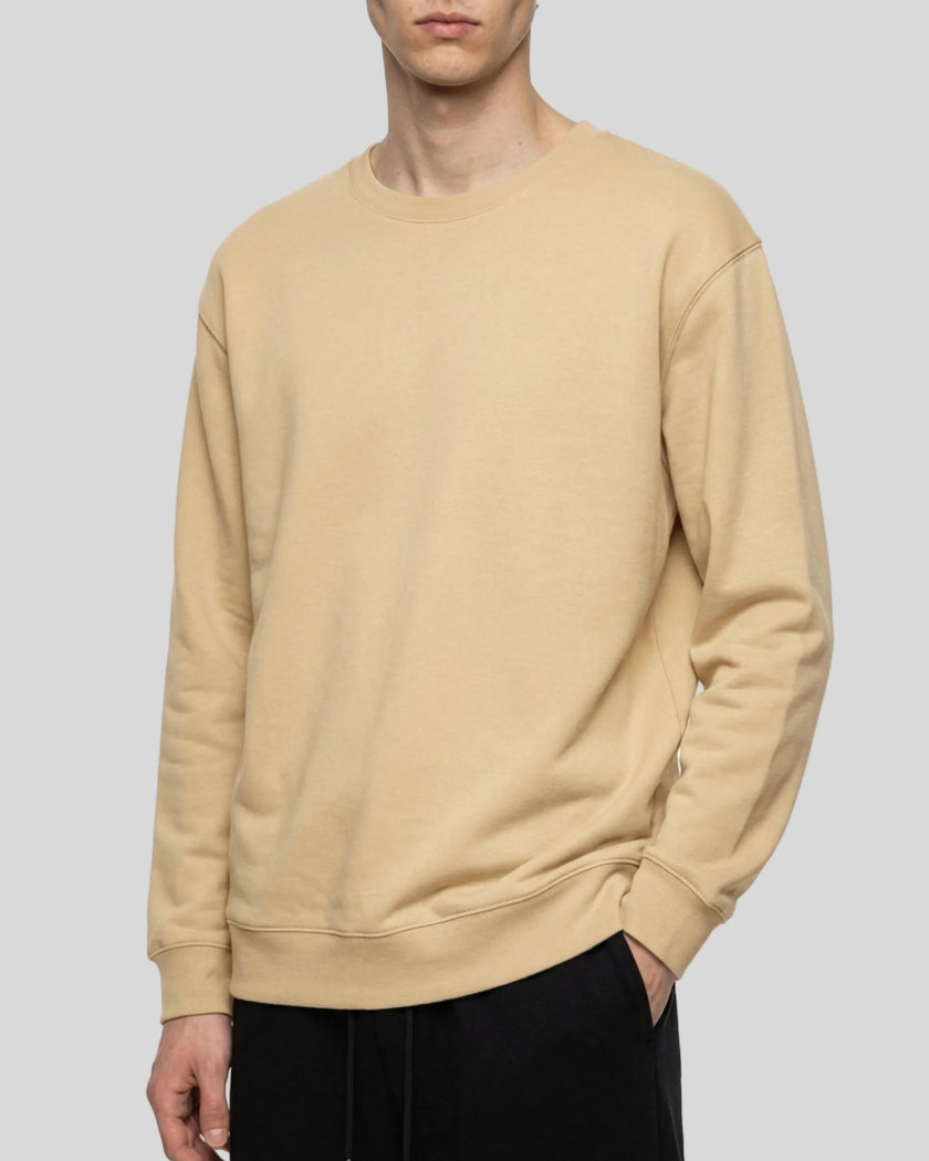 Upper body front angle view of man wearing Everyday Oversized Sweatshirt in Khaki