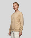 Upper body front angle view of woman wearing Everyday Oversized Sweatshirt in Khaki