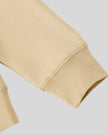 Closeup of long sleeve and ribbed cuff on Everyday Oversized Sweatshirt in Khaki