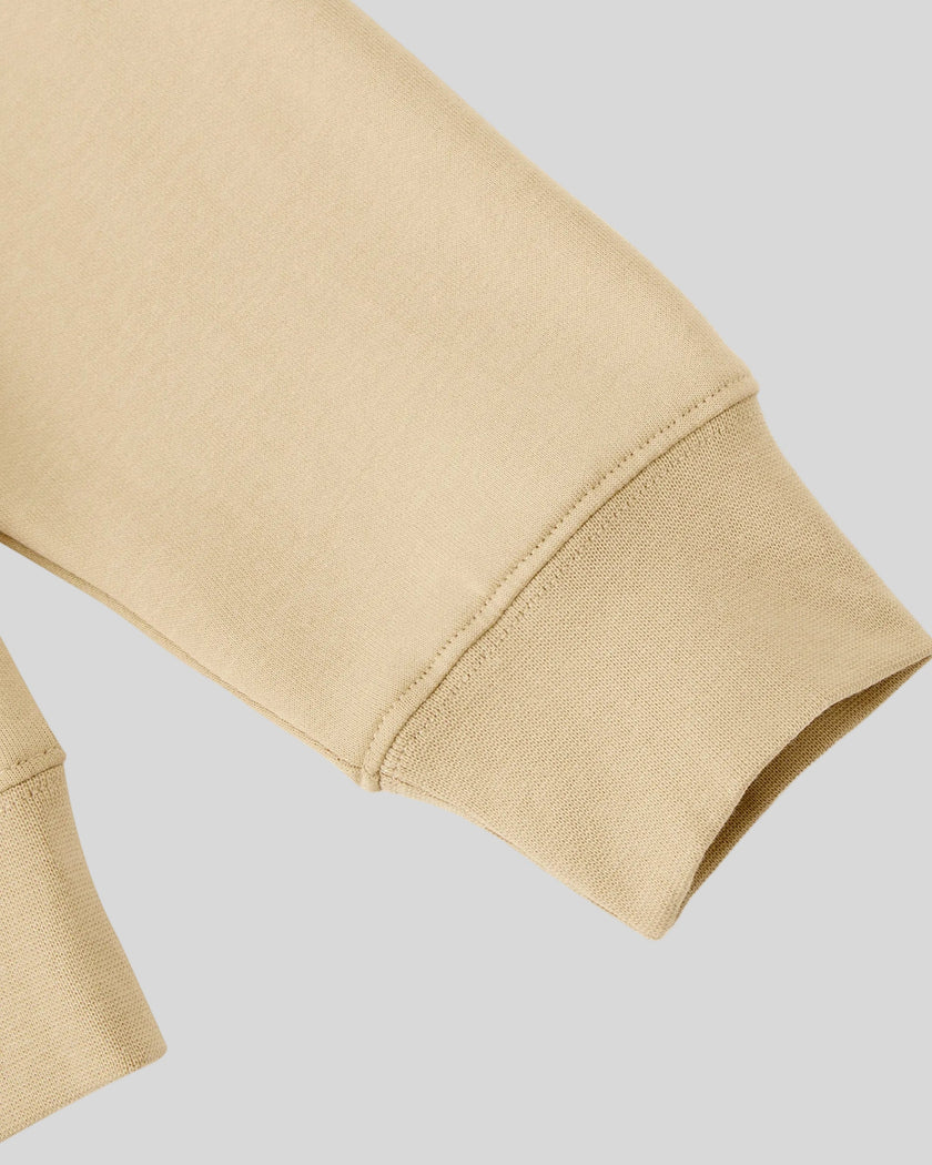 Closeup of long sleeve and ribbed cuff on Everyday Oversized Sweatshirt in Khaki