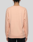 Upper body closer back view of woman wearing Everyday Oversized Sweatshirt in Pink