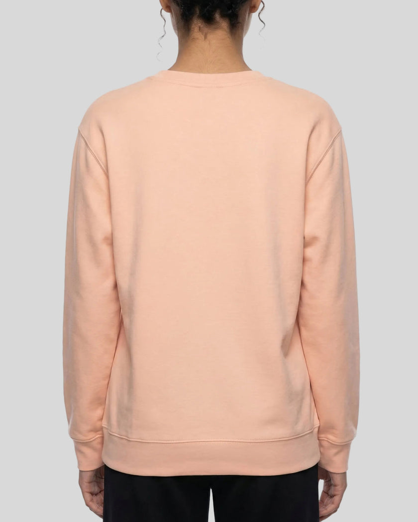 Upper body closer back view of woman wearing Everyday Oversized Sweatshirt in Pink