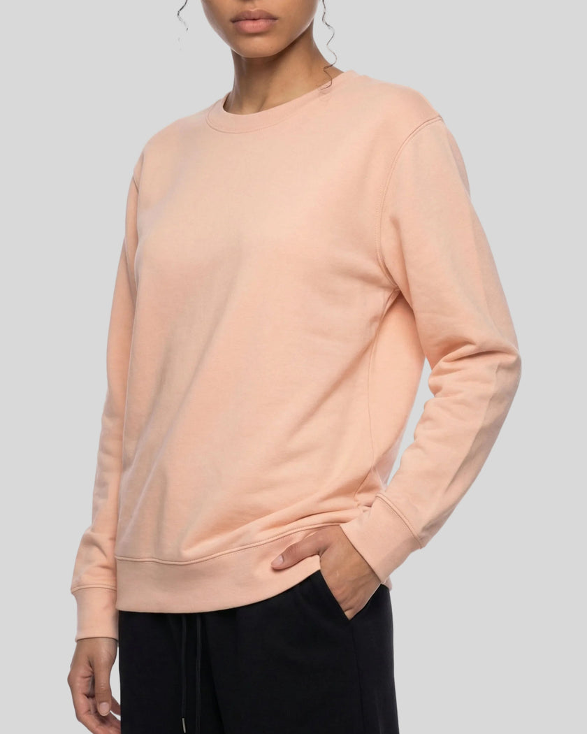 Upper body closer front angle view of woman wearing Everyday Oversized Sweatshirt in Pink
