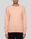 Upper body front view of woman wearing Everyday Oversized Sweatshirt in Pink