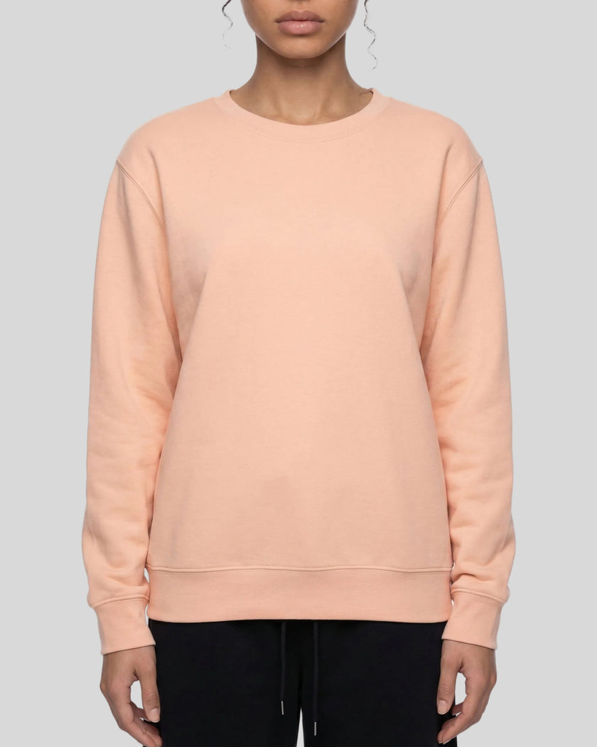 Upper body front view of woman wearing Everyday Oversized Sweatshirt in Pink