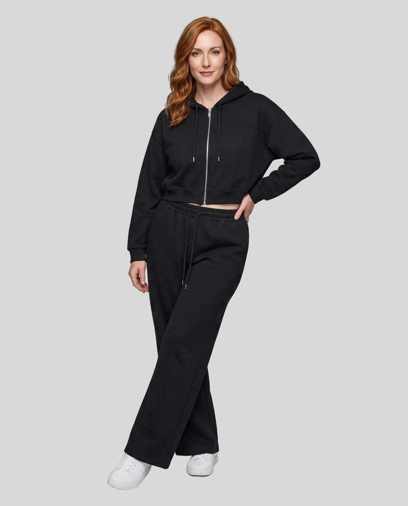 Full-body front view of a model wearing the Everyday Straight Leg Sweatpants in Black