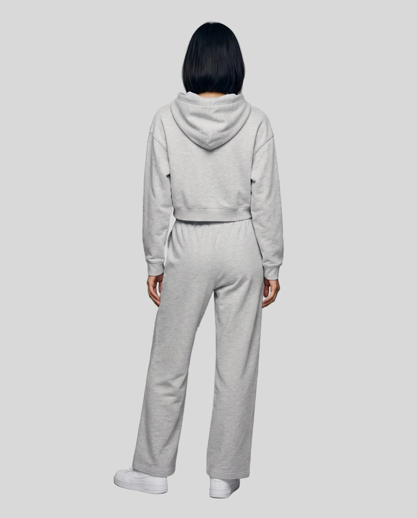 Full-body back view of a model wearing the Everyday Straight Leg Sweatpants in Flower Gray