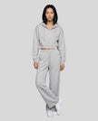 Full-body front view of a model wearing the Everyday Straight Leg Sweatpants in Flower Gray