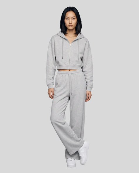 Full-body front view of a model wearing the Everyday Straight Leg Sweatpants in Flower Gray