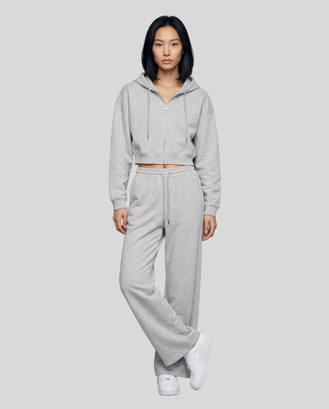Full-body front view of a model wearing the Everyday Straight Leg Sweatpants in Flower Gray