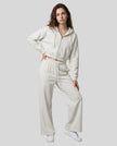Full-body front view of a model wearing the Everyday Straight Leg Sweatpants in Oat Gray