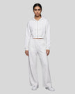 Full-body front view of a model wearing the Everyday Straight Leg Sweatpants in White