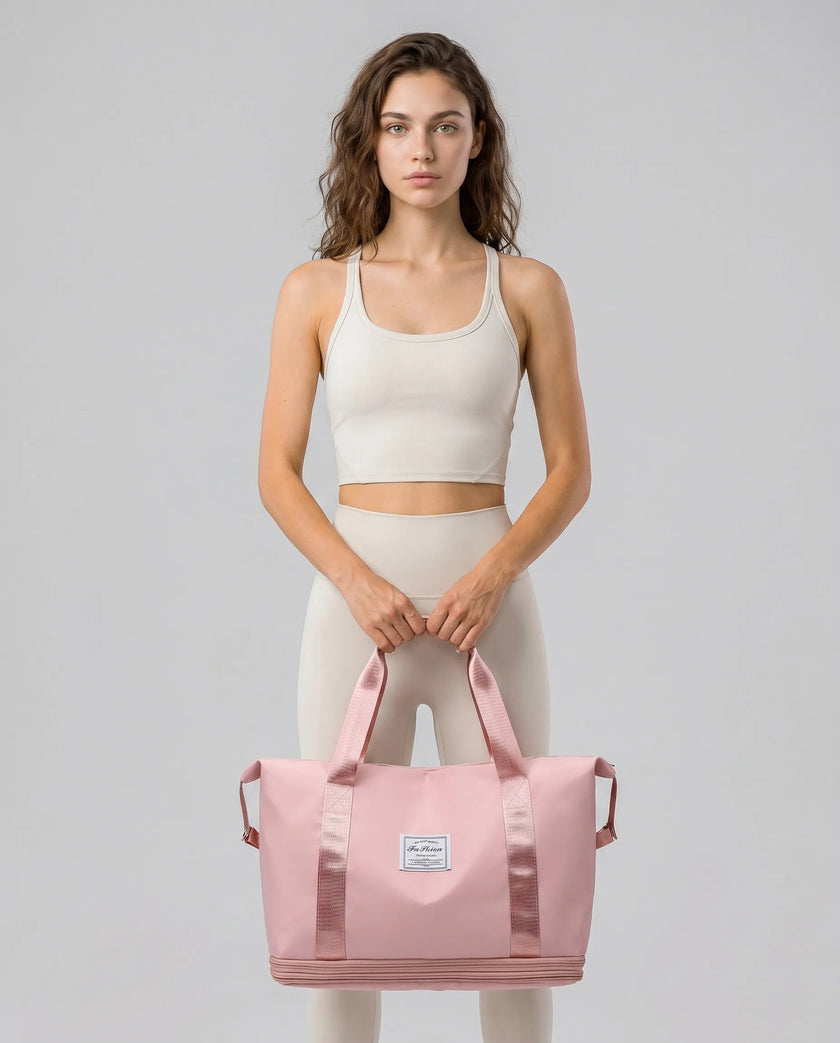 Model carrying ExpandForm Weekender Bag in dusty pink styled for studio sessions and everyday movements