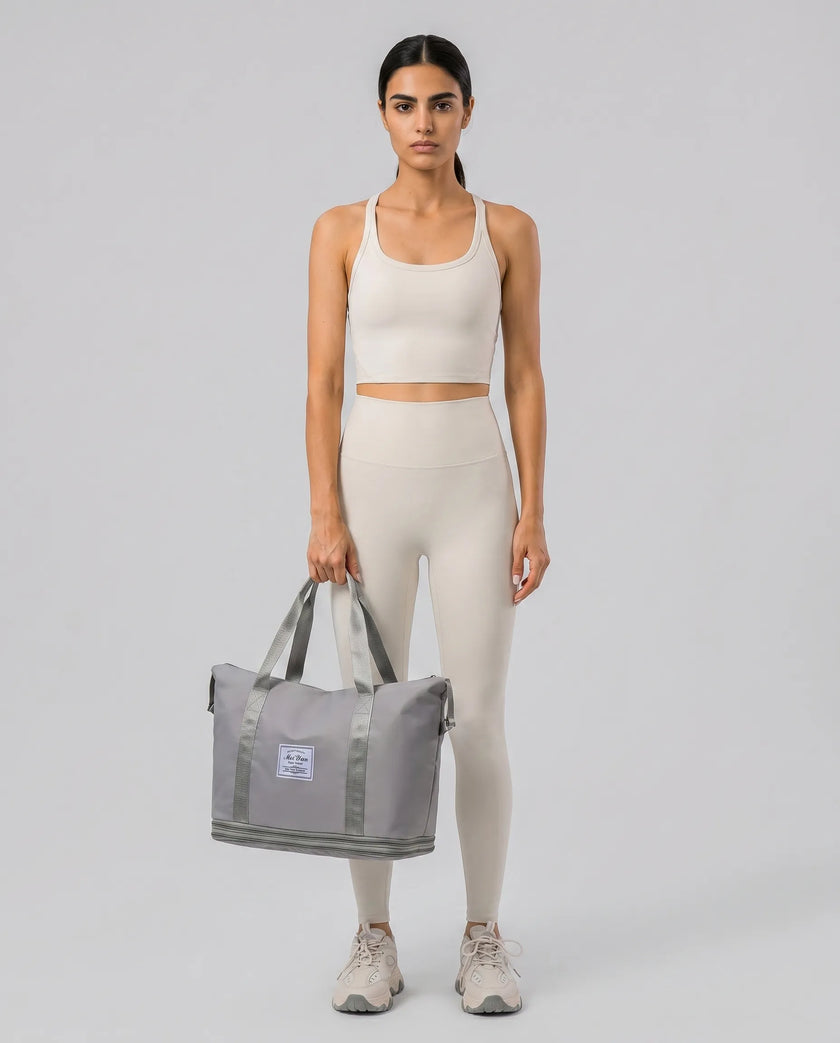 Model carrying ExpandForm Weekender Bag in lavender styled for studio sessions and everyday movements